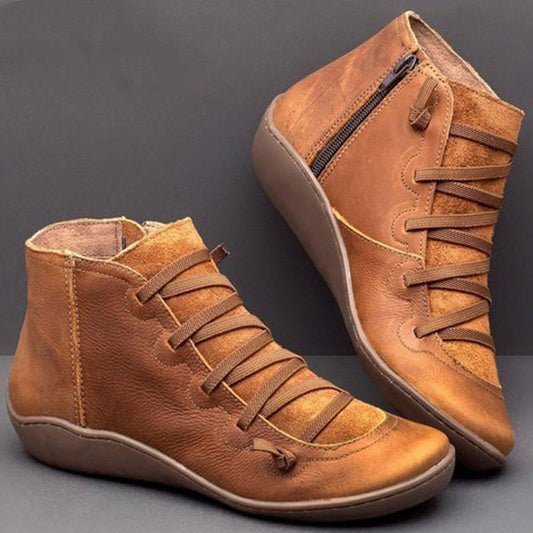 - Des bottes en cuir confortables pour soutenir la voûte plantaire