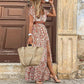 Robe fleurie bohème à col en V tendance 2025