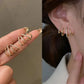 ✨ Boucles d'oreilles élégantes courbées avec zircon – design élégant et moderne