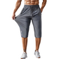 Capris de sport pour homme à séchage rapide et poches zippées